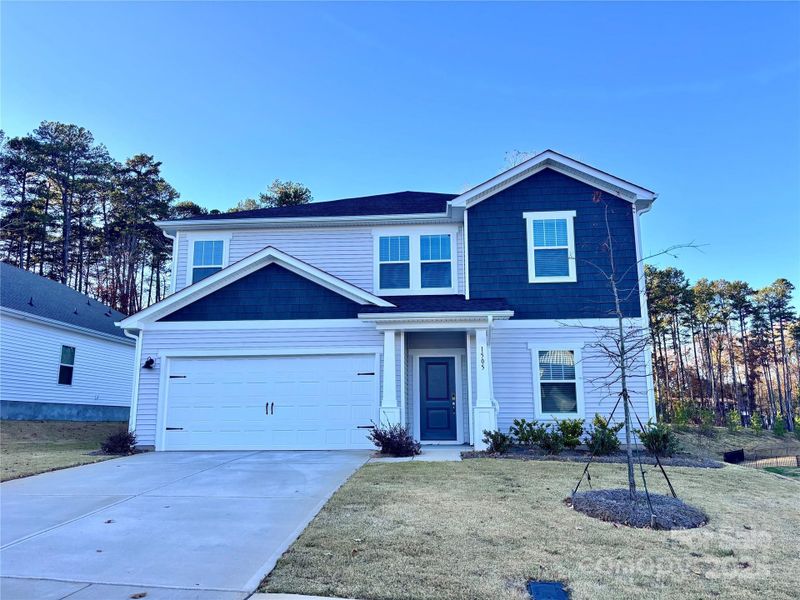Front exterior of a new home in Harper Landing, Stanley, NC, highlighting curb appeal (Image 1).
