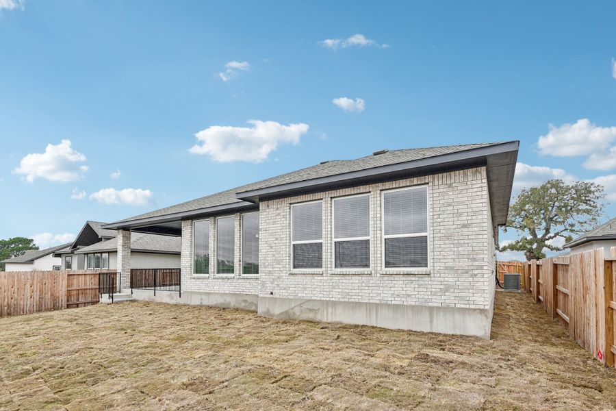Exterior details and patio area of a home in Village at Three Oaks, Seguin (Image 29). Exterior details and patio area of a home in Village at Three Oaks, Seguin (Image 29).