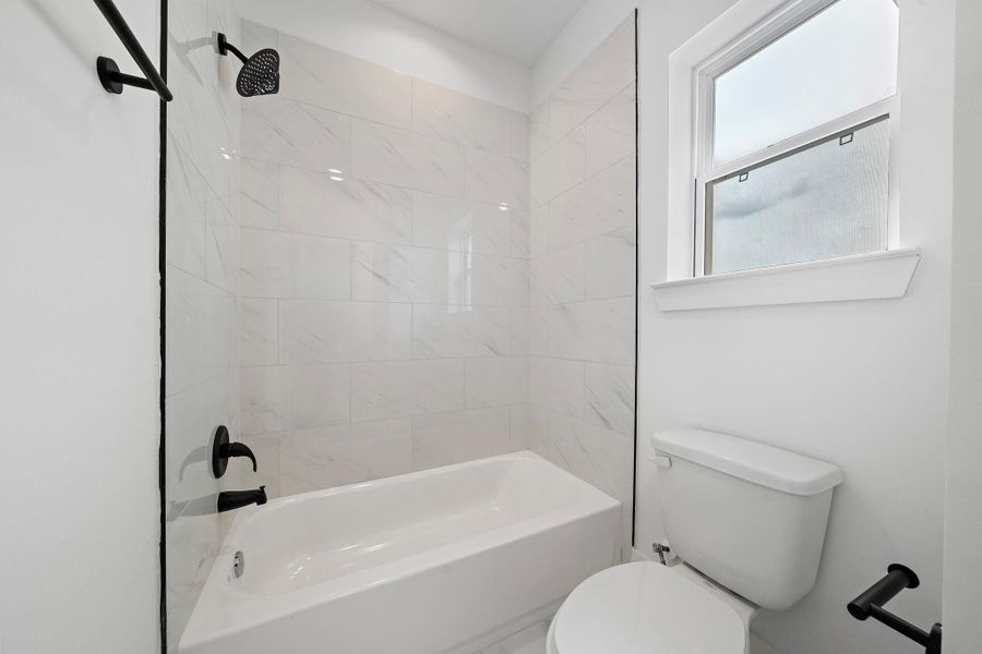 Another view of the third-floor guest bath. (Photos are of a previously completed home. Finishes are subject to change.) Another view of the third-floor guest bath. (Photos are of a previously completed home. Finishes are subject to change.)