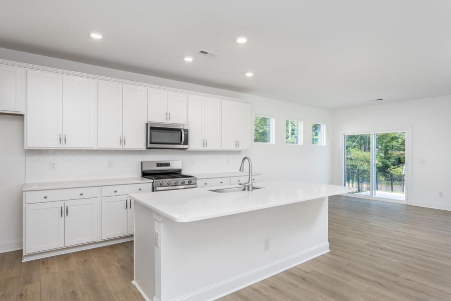 Furnished interior view inside a new home in Running Brook Townes, Durham (Image 5).