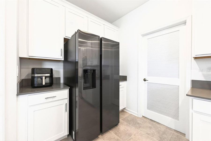 Furnished interior view inside a new home in Tohoqua, Kissimmee (Image 7).
