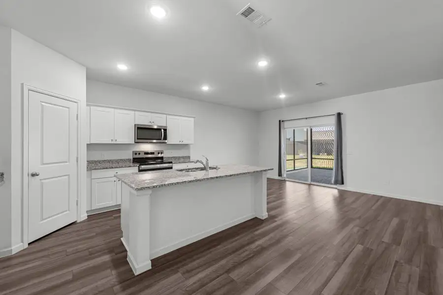Double sliding doors lets lots of natural light into the home