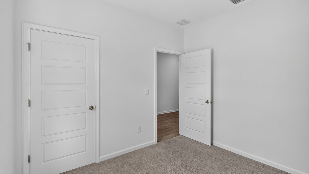 Spacious, unfurnished interior of a new home in American Village, Palm Coast (Image 21).