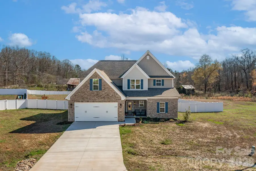Front exterior of a new home in , Lexington, NC, highlighting curb appeal (Image 2). Front exterior of a new home in , Lexington, NC, highlighting curb appeal (Image 2).
