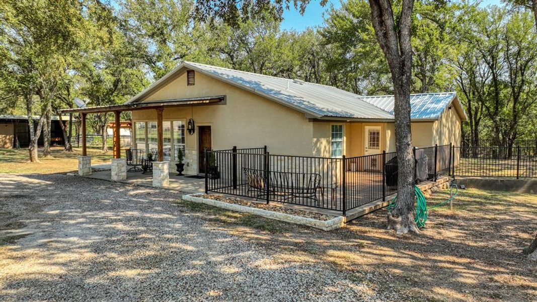 View of front of home featuring a patio area