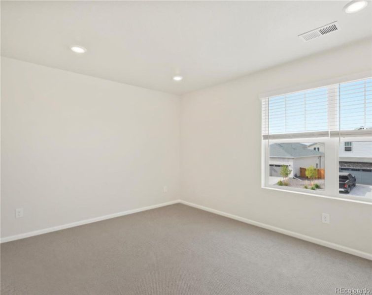 Spacious, unfurnished interior of a new home in Buffalo Highlands: The Flora Collection, Commerce City (Image 13).