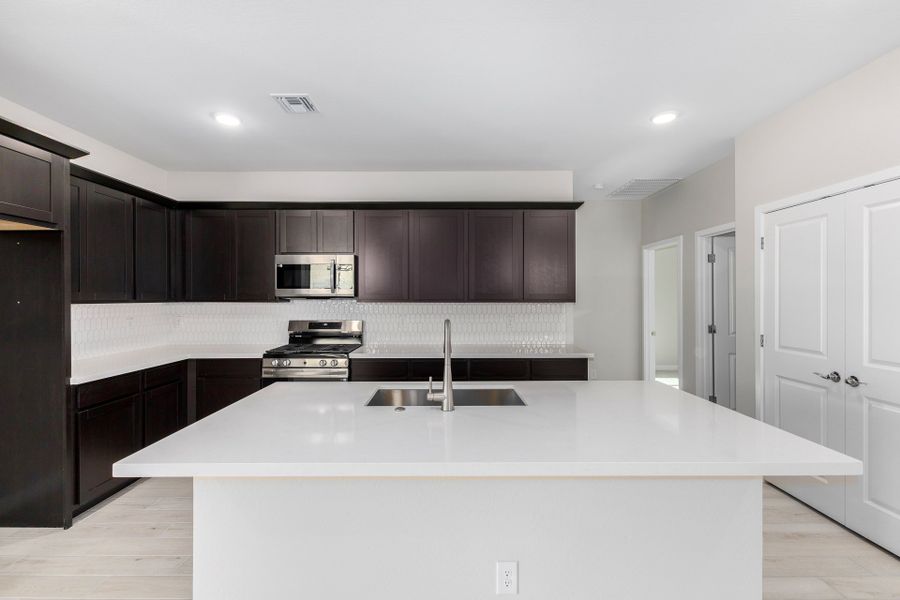 Furnished interior view inside a new home in Sunrise, Sun City West (Image 5).