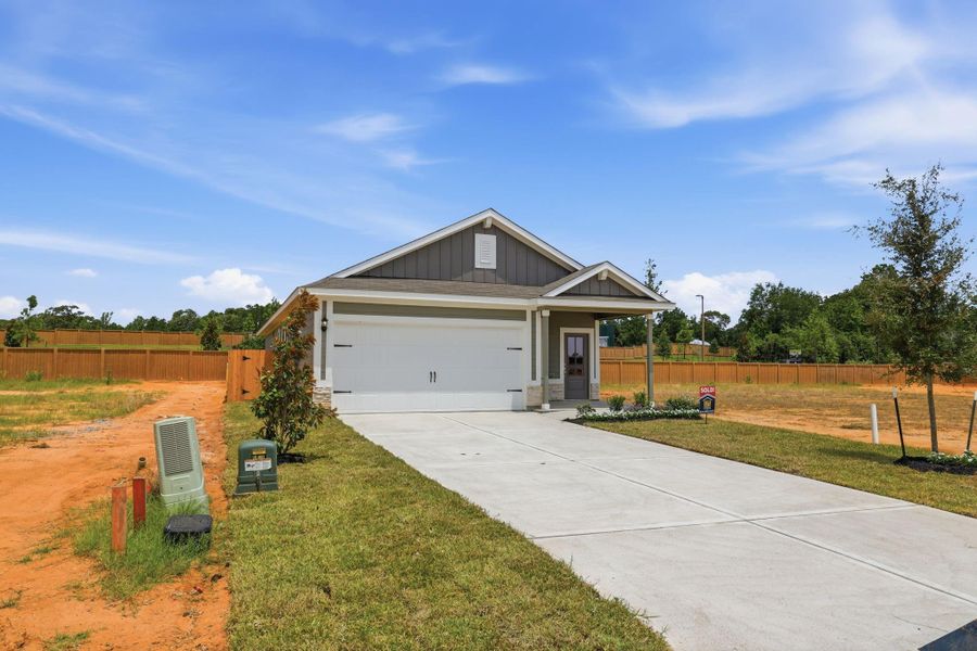 Front exterior of a new home in , Hockley, TX, highlighting curb appeal (Image 1). Front exterior of a new home in , Hockley, TX, highlighting curb appeal (Image 1).