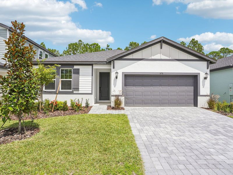 Front exterior of a home in the Ridgehaven - Signature Series community, located in Ormond Beach, FL (Image 13). Front exterior of a home in the Ridgehaven - Signature Series community, located in Ormond Beach, FL (Image 13).