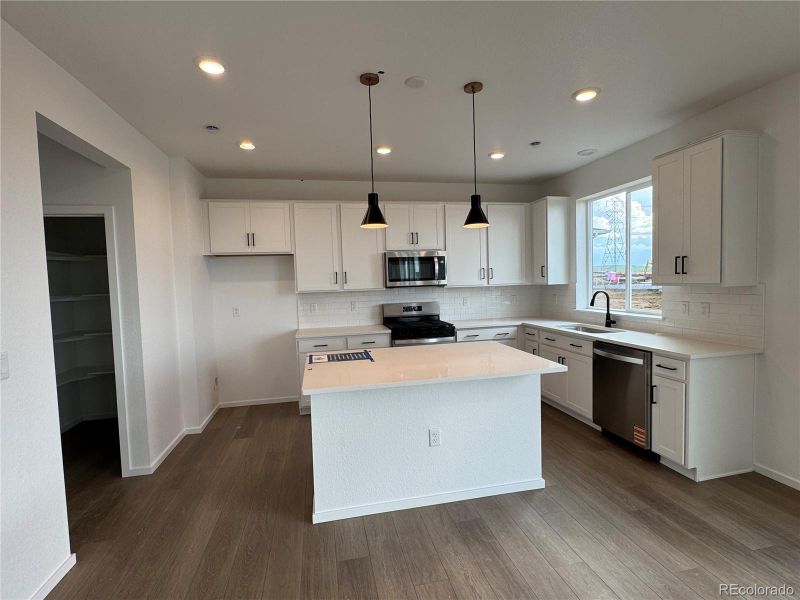 Furnished interior view inside a new home in Harvest Crossing, Aurora (Image 6). Furnished interior view inside a new home in Harvest Crossing, Aurora (Image 6).