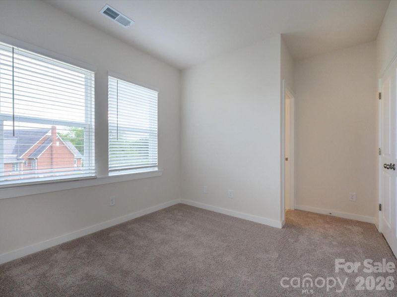 Spacious, unfurnished interior of a new home in Central Living at Craig, Charlotte (Image 29).