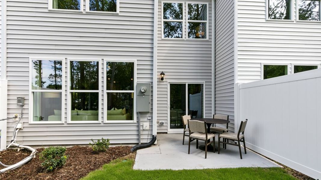 Exterior details and patio area of a home in Chapel Townes, Raleigh (Image 3). Exterior details and patio area of a home in Chapel Townes, Raleigh (Image 3).