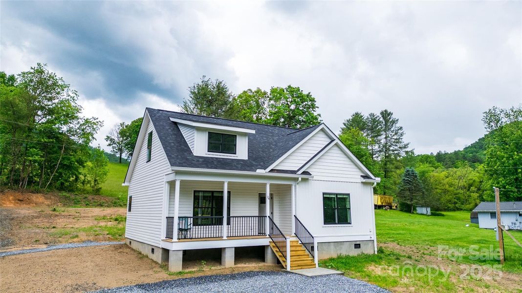 Front exterior of a new home in , Tuckasegee, NC, highlighting curb appeal (Image 21).
