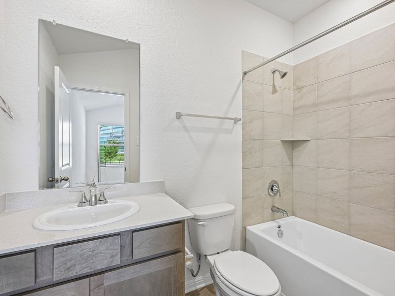 Furnished interior view inside a new home in Riverbend at Double Eagle - Reserve Collection, Cedar Creek (Image 6).