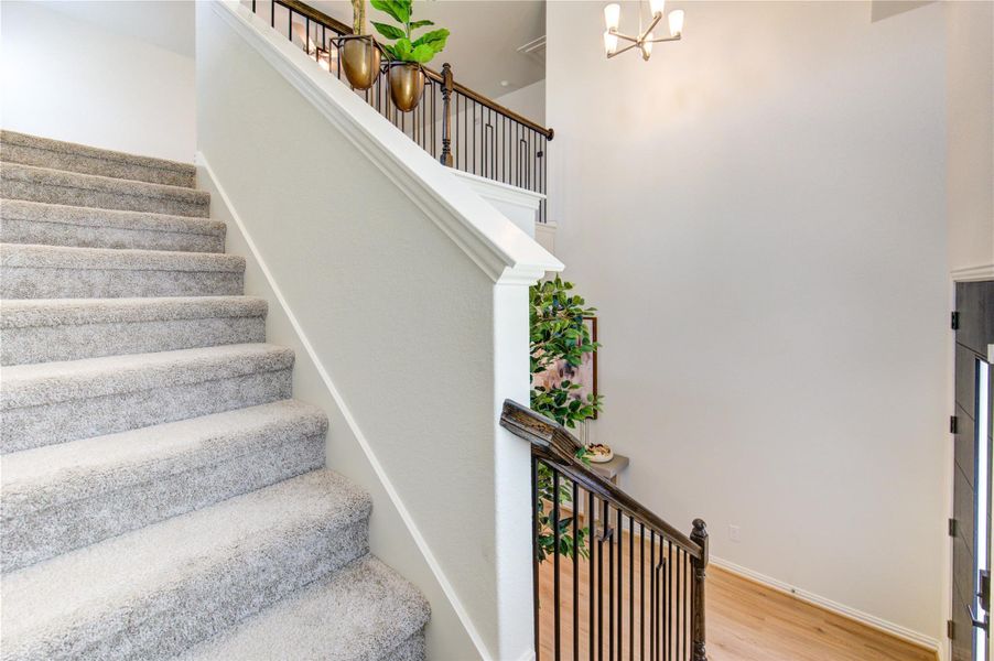 Let's check out the upstairs now! Gotta love the wrought iron balusters - such class!
