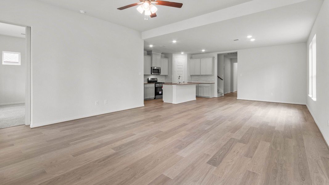 Representative furnished interior of a home built from the Capri II by Brightland Homes in Bridgeland Creekland Village, Cypress (Image 9).