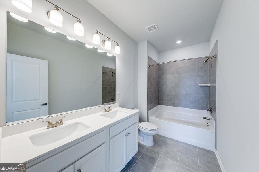 Furnished interior view inside a new home in Chimney Oaks Townhomes, Homer (Image 7).