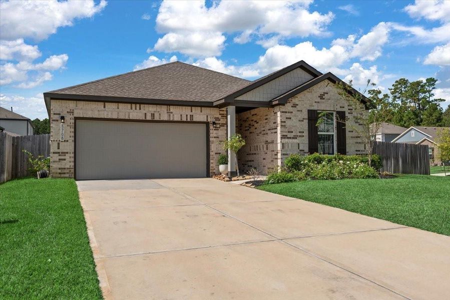 Front exterior of a new home in , Montgomery, TX, highlighting curb appeal (Image 1). Front exterior of a new home in , Montgomery, TX, highlighting curb appeal (Image 1).
