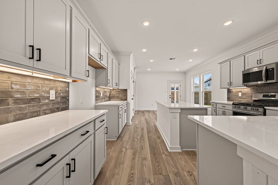 Furnished interior view inside a new home in Aldeana, Bonney (Image 13).