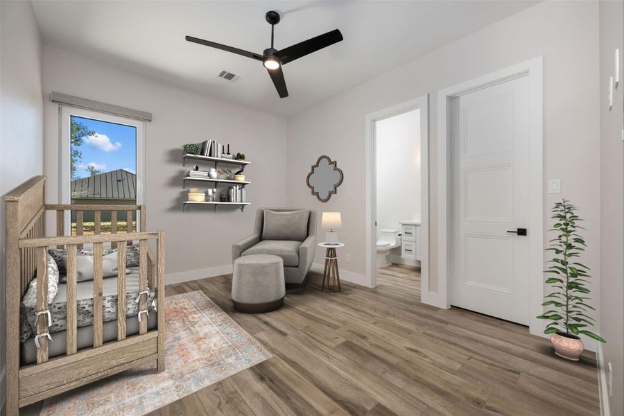 Sitting room featuring hardwood / wood-style flooring and ceiling fan
