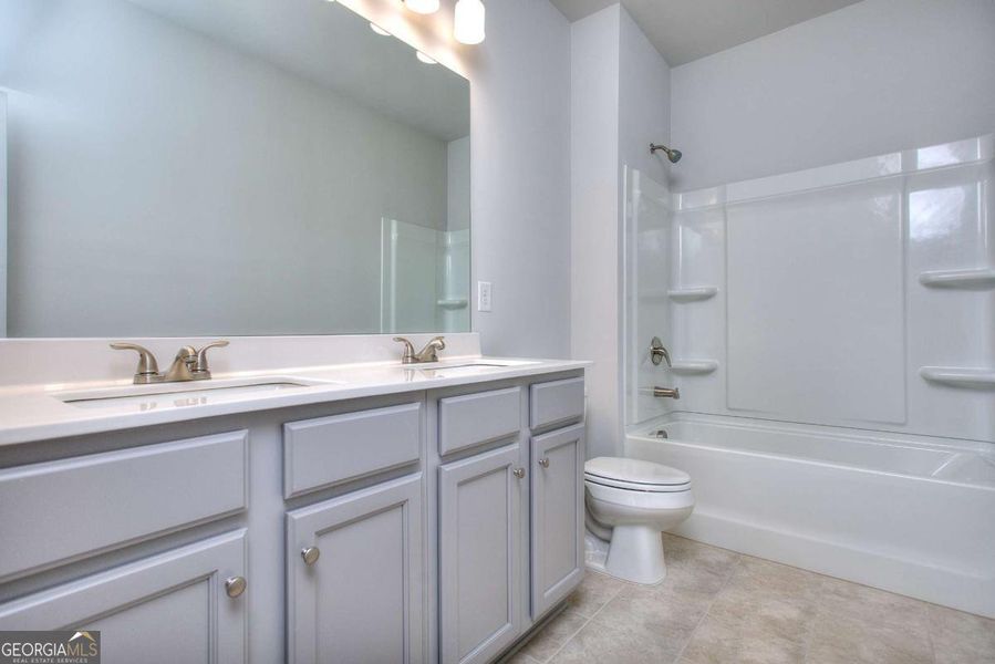 Furnished interior view inside a new home in Chimney Oaks Townhomes, Homer (Image 9).