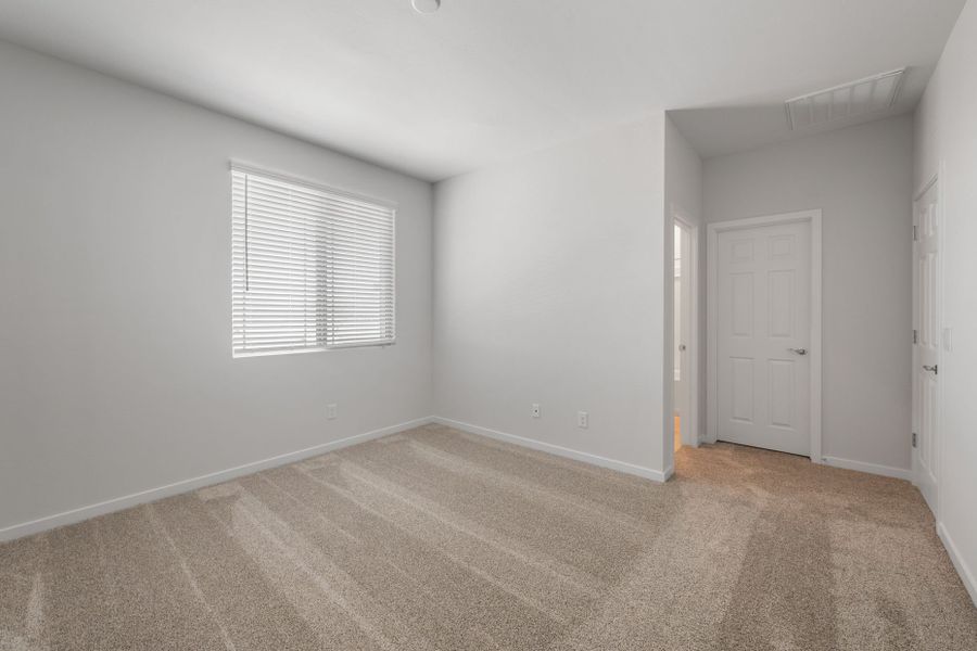 Spacious, unfurnished interior of a new home in Blossom Rock, Apache Junction (Image 18).