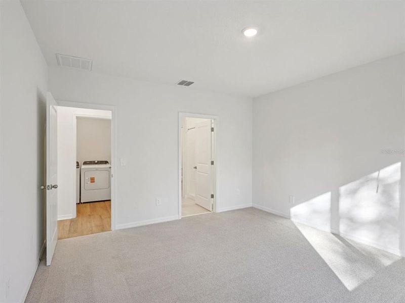 Spacious, unfurnished interior of a new home in Oakfield Trails - Premier Series, Parrish (Image 14).