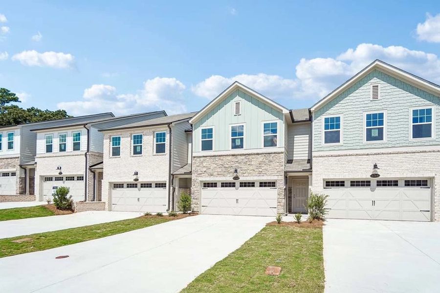 Representative Photo: Front Exterior of Townhome Building