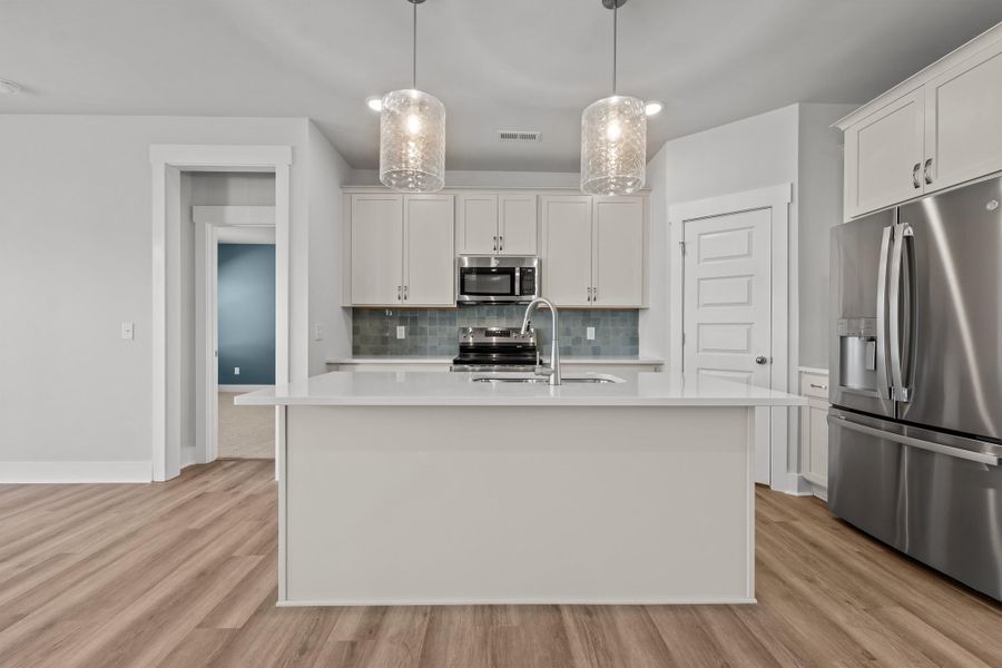 Representative furnished interior of a home built from the Raindrops on Roses by Garman Homes in McConnell Ridge, McLeansville (Image 3).
