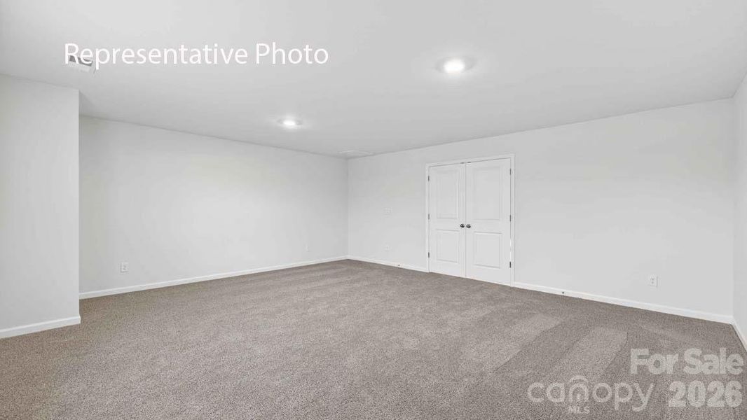 Spacious, unfurnished interior of a new home in Wallace Springs, Statesville (Image 19).