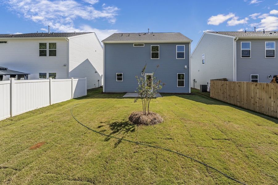 Exterior details and patio area of a home in Richmond Hill, Inman (Image 2).