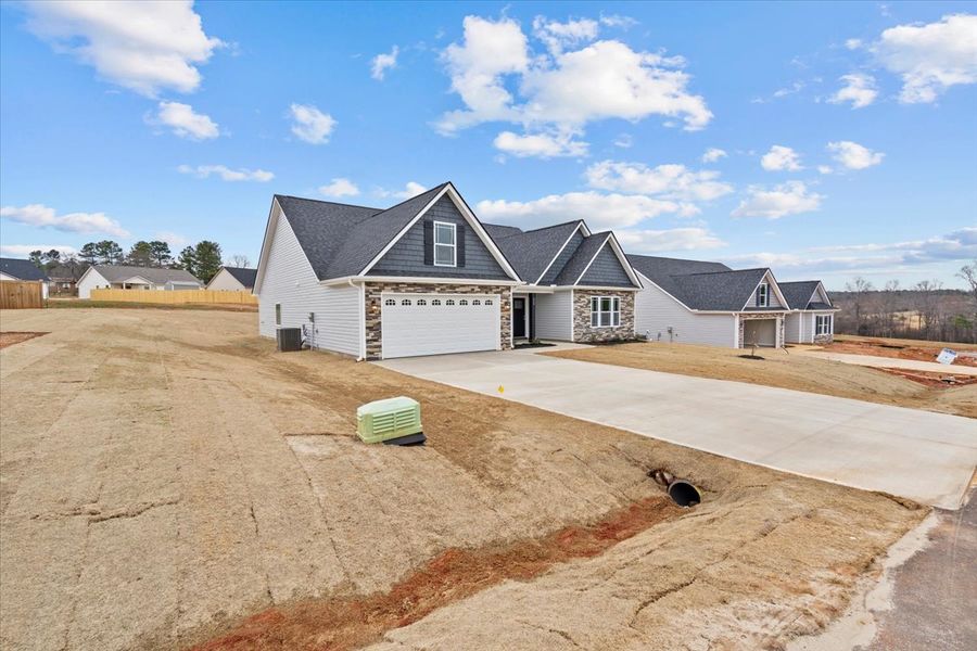 Representative exterior photo of a completed home built from the Arcadia by Enchanted Homes in Ballentine Ridge, Lyman, SC (Image 2).