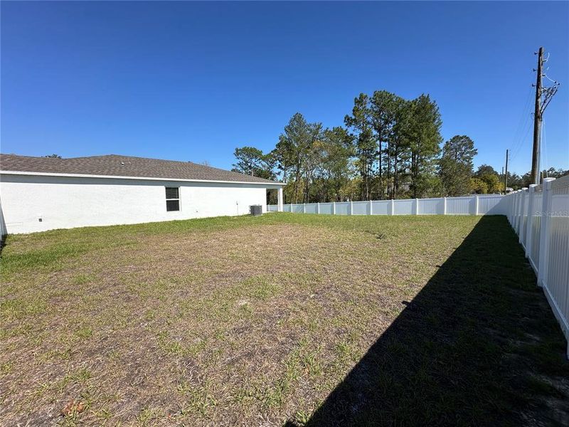 Exterior details and patio area of a home in Marion Oaks, Ocala (Image 25).