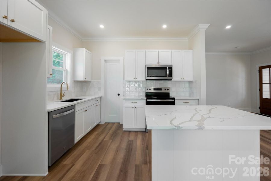 Furnished interior view inside a new home in , Huntersville (Image 5).