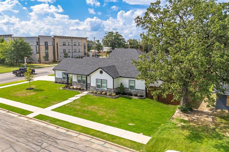 Front exterior of a new home in , Sulphur Springs, TX, highlighting curb appeal (Image 26). Front exterior of a new home in , Sulphur Springs, TX, highlighting curb appeal (Image 26).