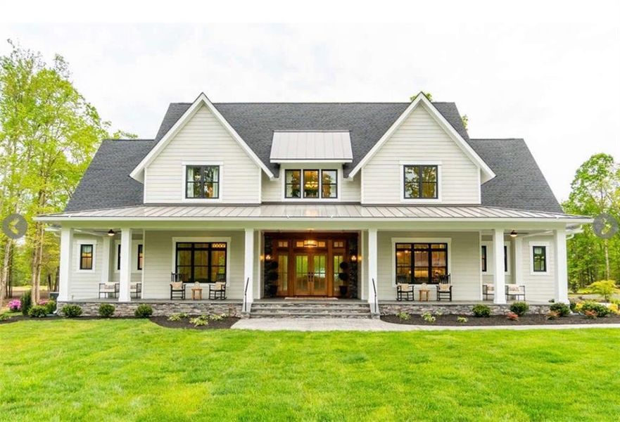 Front exterior of a new home in , Commerce, GA, highlighting curb appeal (Image 1).