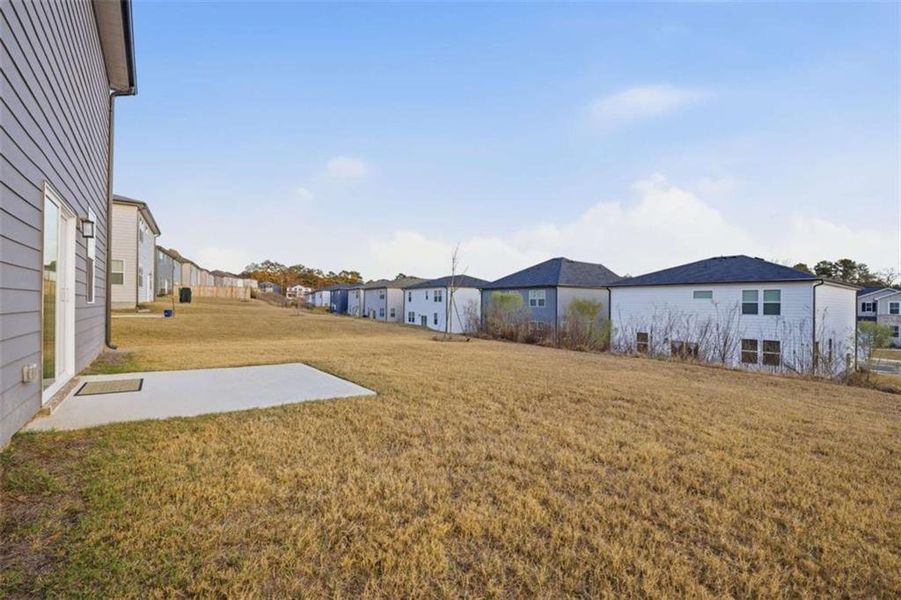 Exterior details and patio area of a home in Kingsley Creek, Lithonia (Image 25).