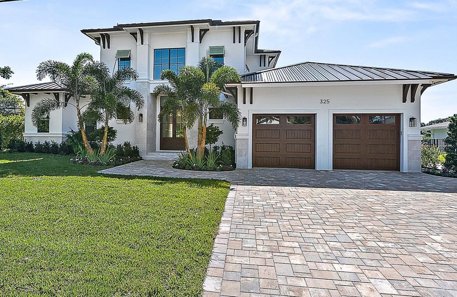 Front exterior of a new home in , Tequesta, FL, highlighting curb appeal (Image 15).