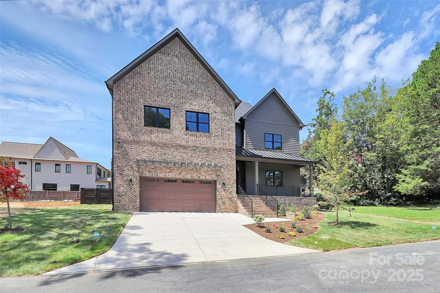 Front exterior of a new home in , Charlotte, NC, highlighting curb appeal (Image 25).
