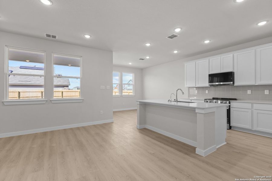 Furnished interior view inside a new home in Cinco Lakes, San Antonio (Image 8).