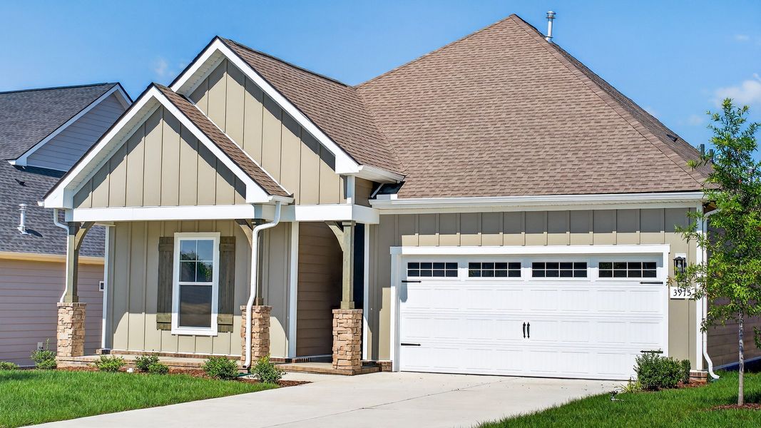Front exterior of a new home in McClure Farms, Columbia, TN, highlighting curb appeal (Image 19). Front exterior of a new home in McClure Farms, Columbia, TN, highlighting curb appeal (Image 19).