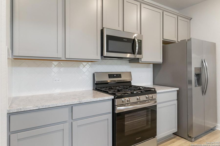 Furnished interior view inside a new home in Timber Creek, San Antonio (Image 9).