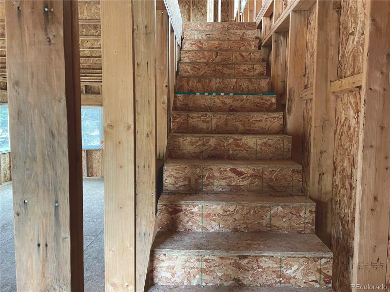 Stairs from main floor going up.