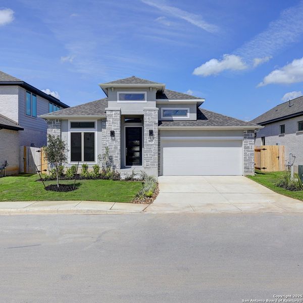 Front exterior of a new home in Kallison Ranch 50', San Antonio, TX, highlighting curb appeal (Image 25).