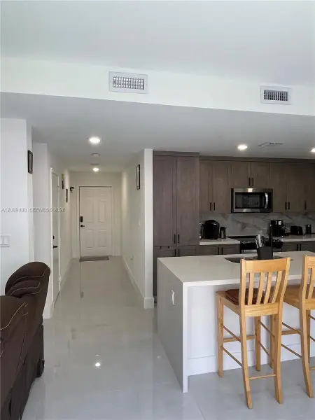 Furnished interior view inside a new home in , Florida City (Image 16).