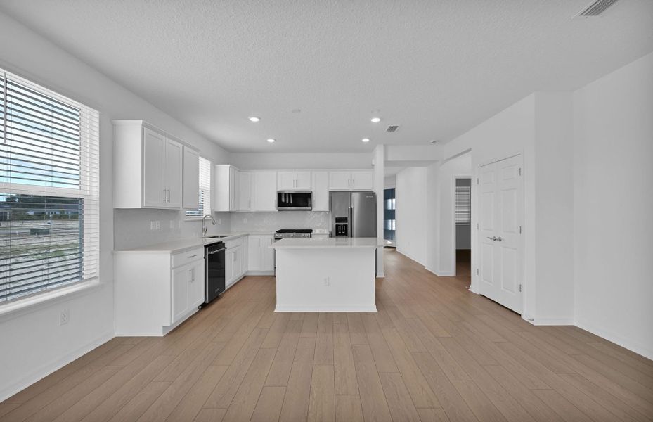 Furnished interior view inside a new home in Del Webb Wildlight, Yulee (Image 6).