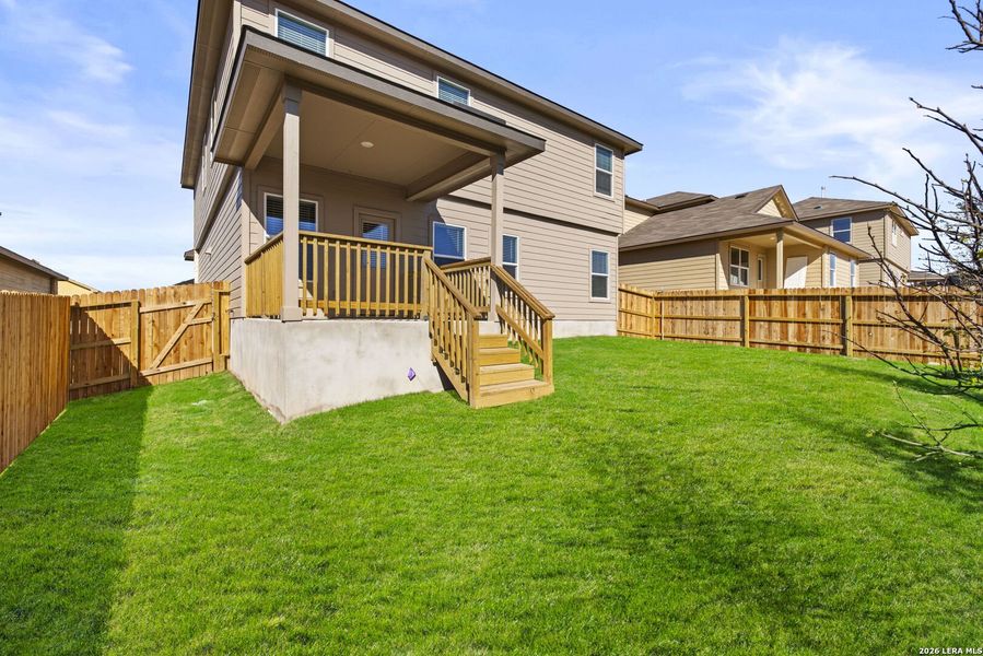 Exterior details and patio area of a home in Redbird Ranch, San Antonio (Image 2).