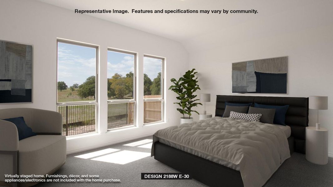 Carpeted bedroom with multiple windows and lofted ceiling Carpeted bedroom with multiple windows and lofted ceiling