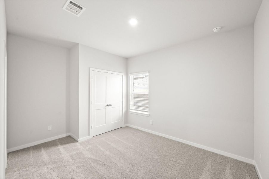 Spacious, unfurnished interior of a new home in Sunterra, Katy (Image 18).