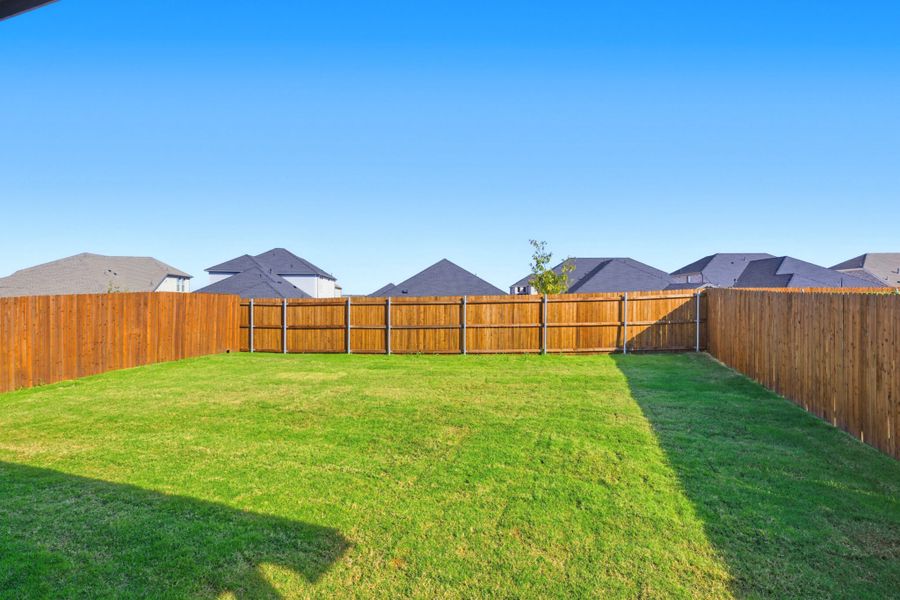 Exterior details and patio area of a home in Elevon, Lavon (Image 3).